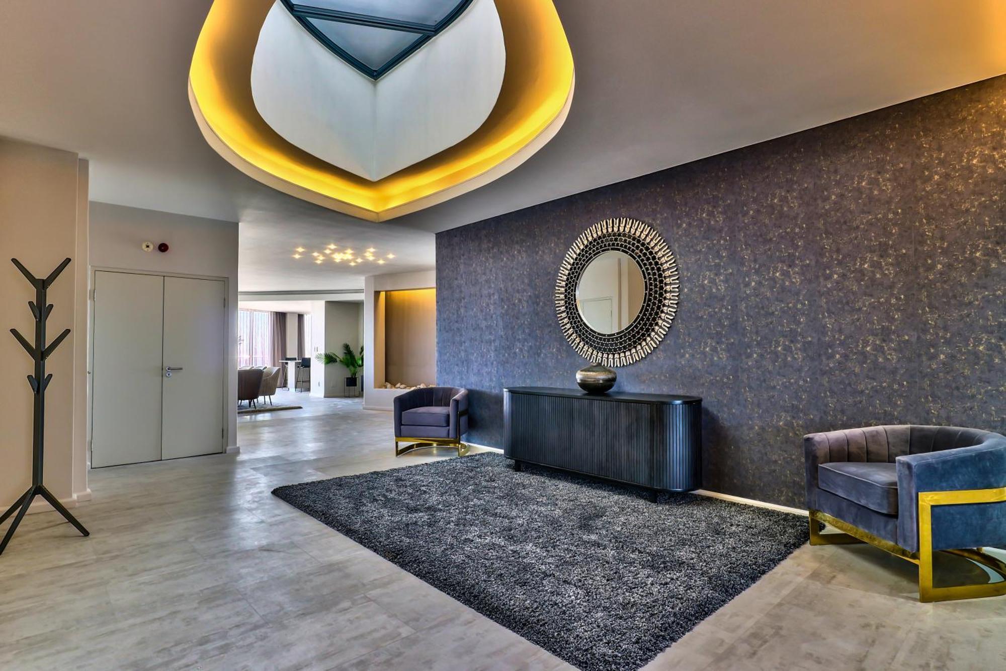 Aquarius Luxury Suites Bloubergstrand Buitenkant foto
