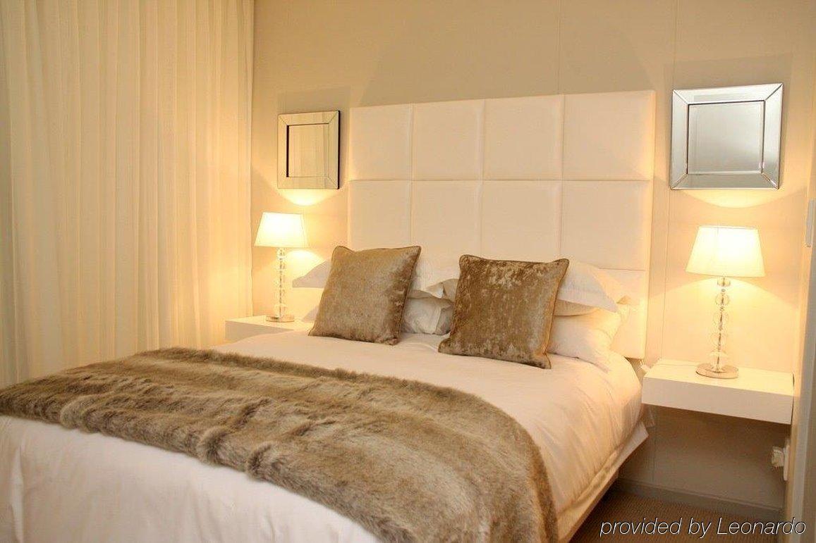 Aquarius Luxury Suites Bloubergstrand Buitenkant foto